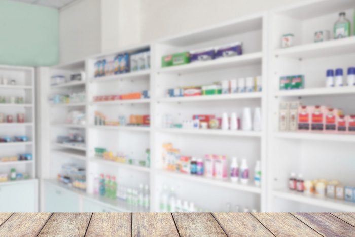 pharmacy shelves blurred