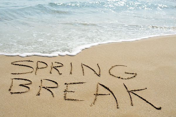 College Spring Break Drug Alcohol Use, beach with Spring Break written in sand