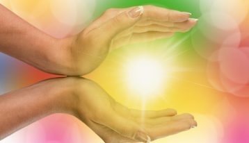 Holistic Support for Addiction Recovery, Holistic Support, hands holding burst of light