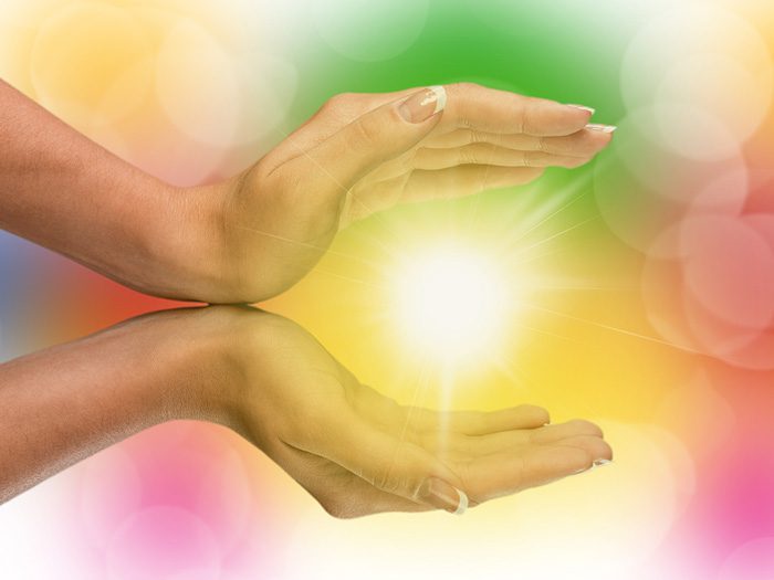 Holistic Support for Addiction Recovery, Holistic Support, hands holding burst of light